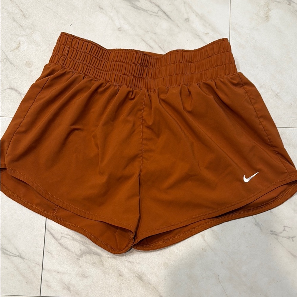 Nike Women's Athletic Shorts in Rust